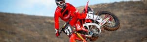 picture of rider on a dirt bike for motorcycle oil aricle